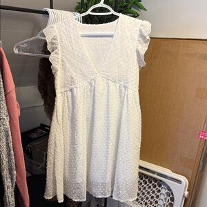 White Sleeveless Dress with Textured Dots